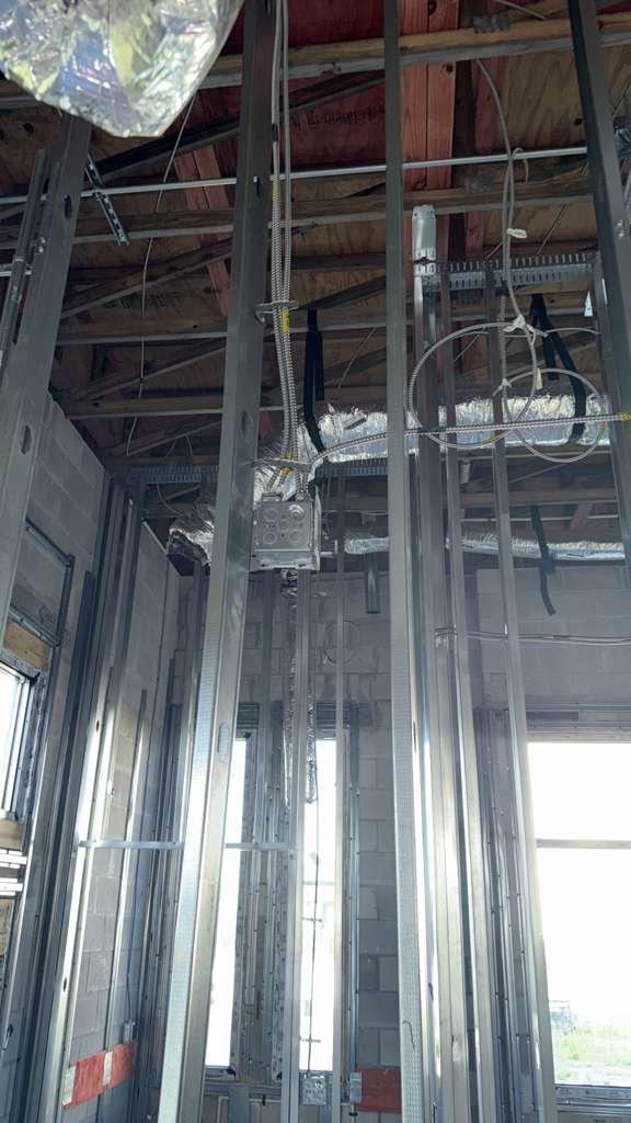 Commercial electrical rough-in with metal stud framing